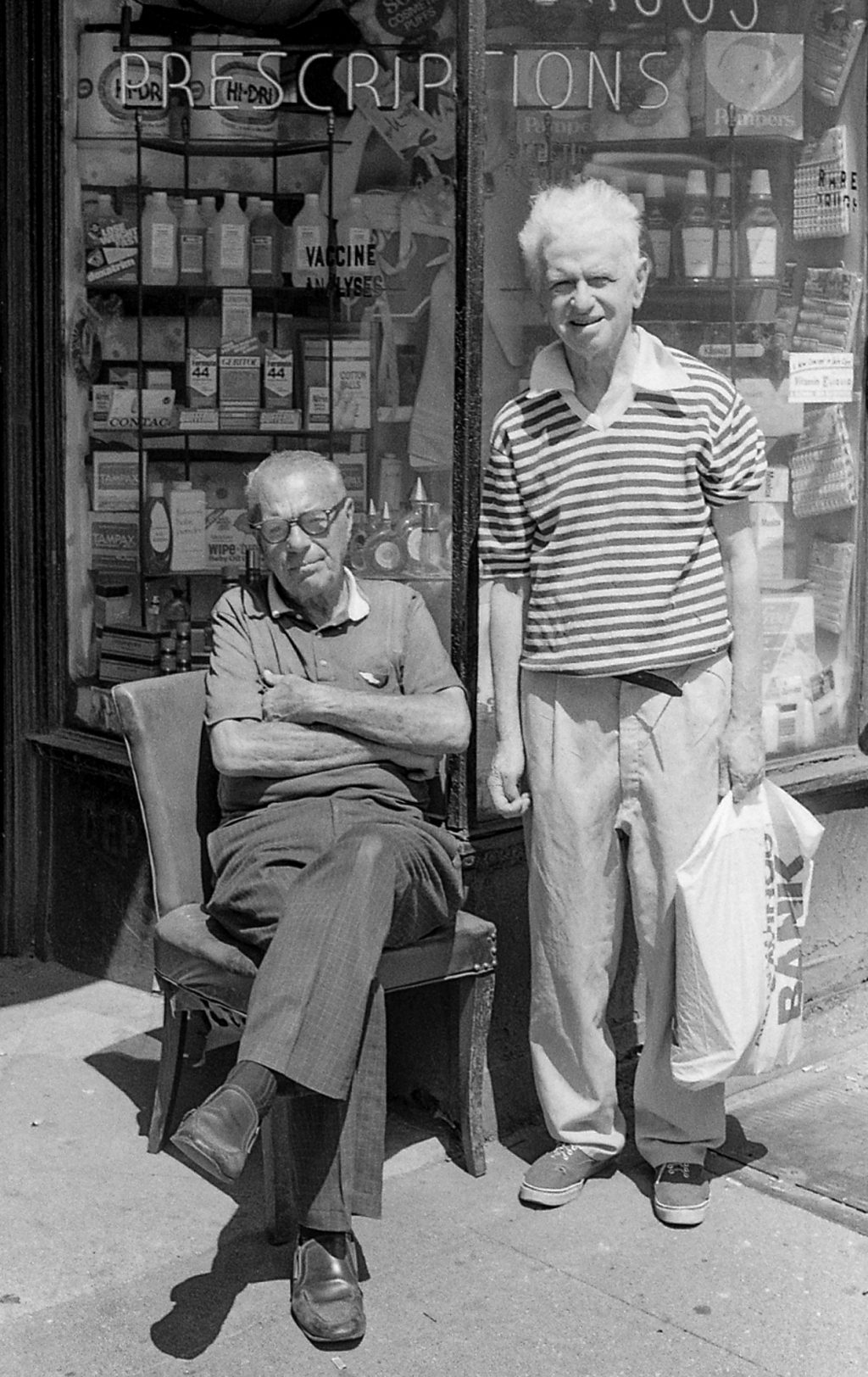 B&W Barbara Ehlers photograph of owner and friend outside of 255 West 105th Street